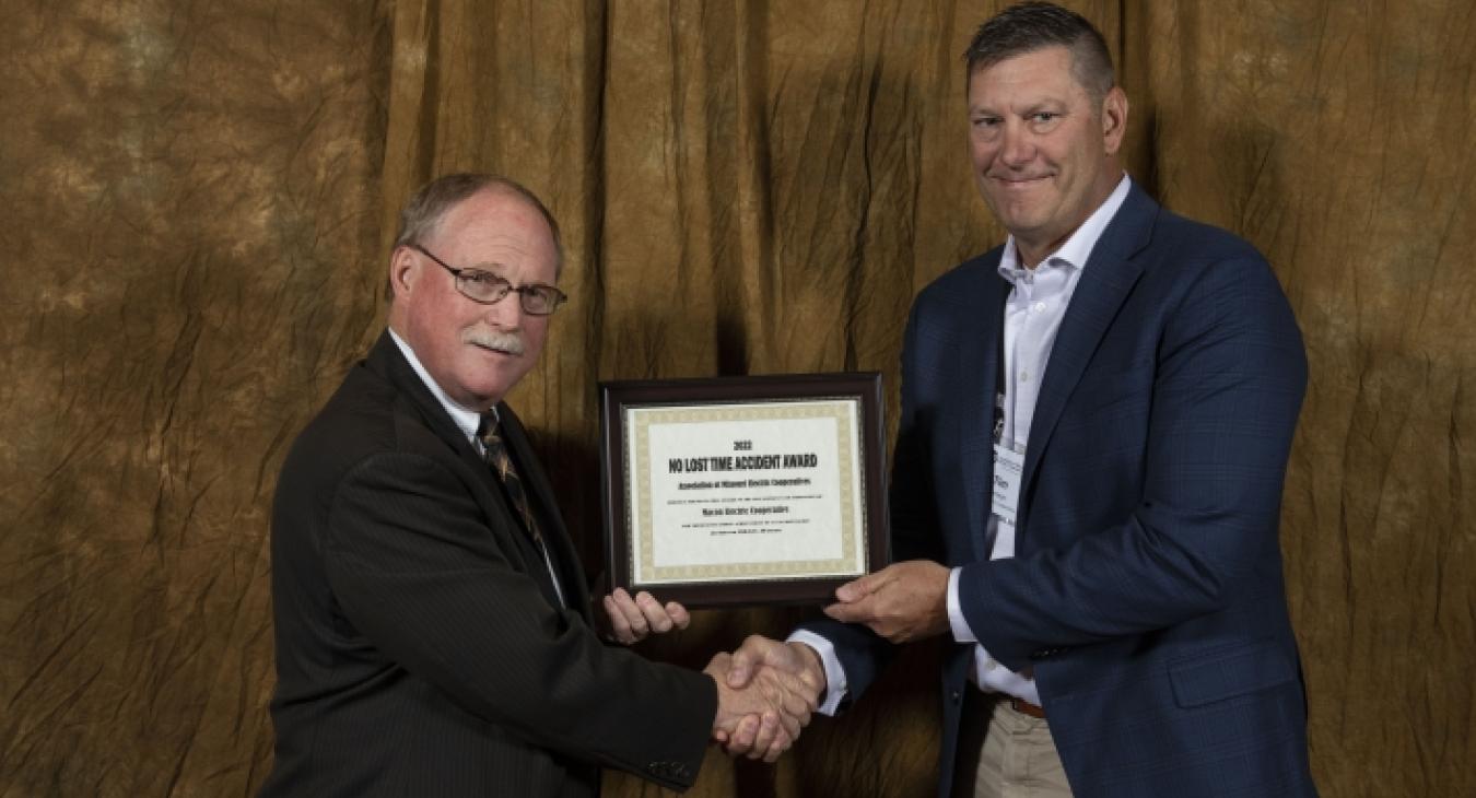 Tim Korman accepts no-lost time award